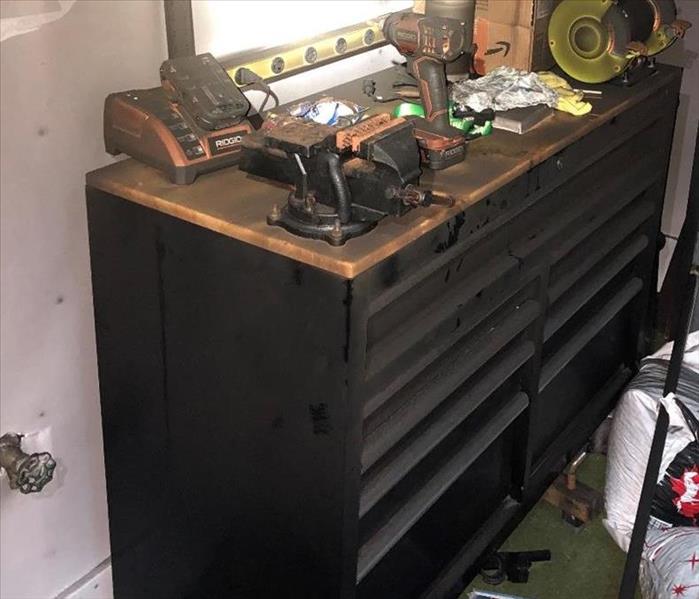 tool bench covered in soot